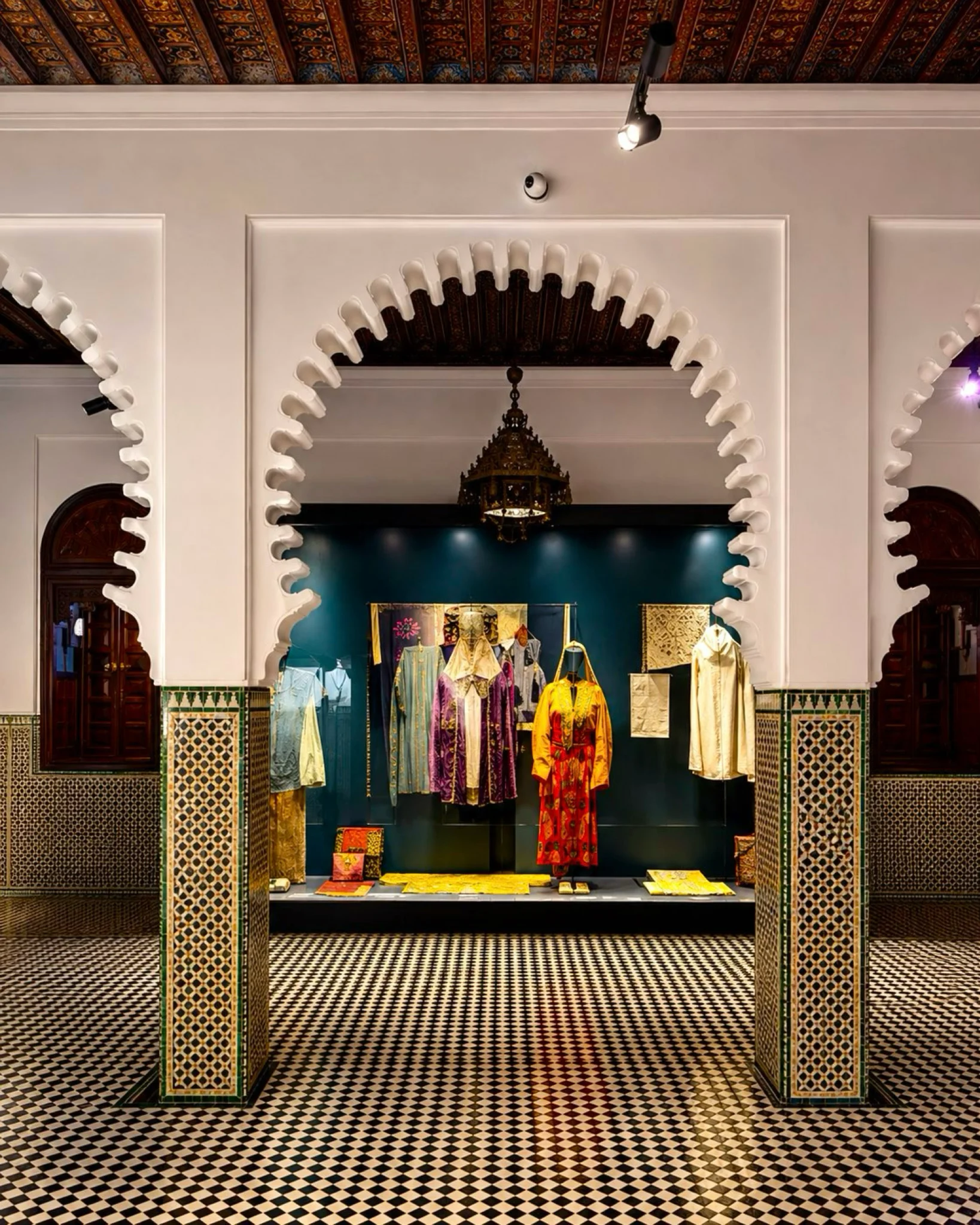 Traditional dress displayed in a museum interior in Tétouan